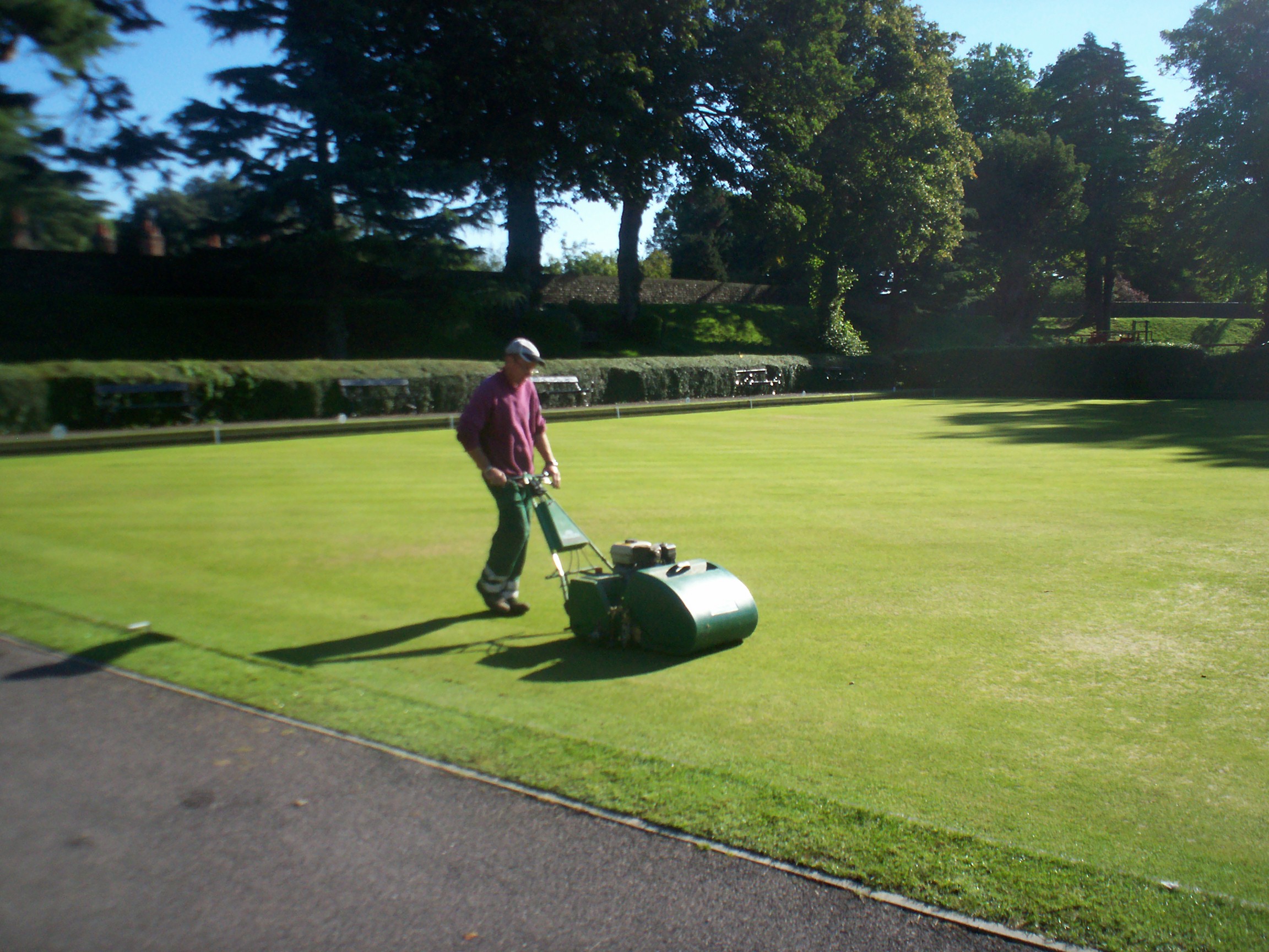 Mick cutting the green